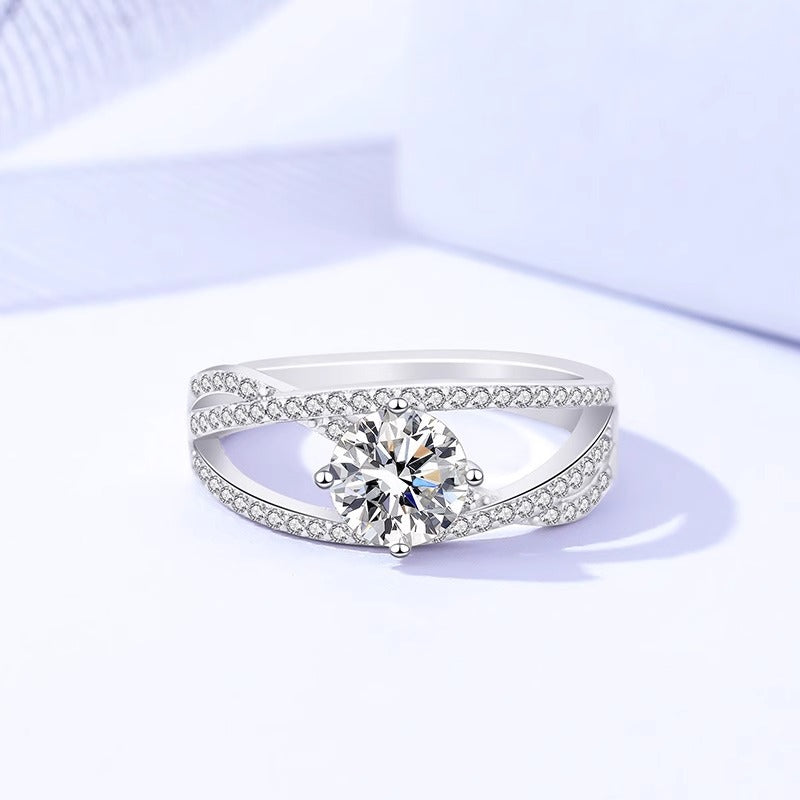 Brilliant Twist Moissanite Ring – Sterling Silver with Side Stones