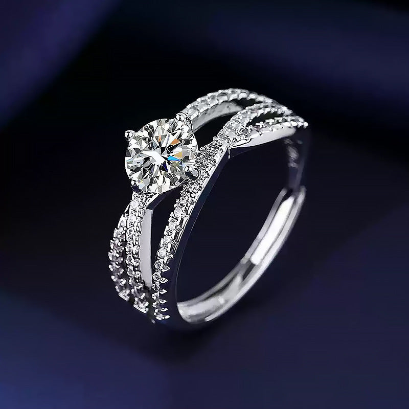 Brilliant Twist Moissanite Ring – Sterling Silver with Side Stones