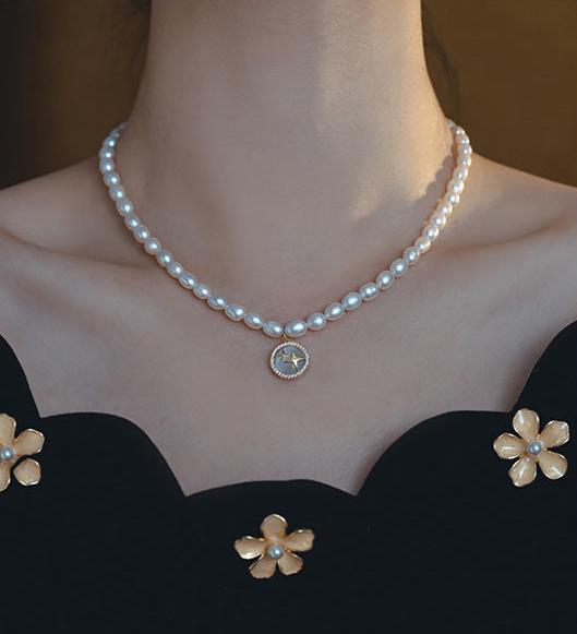 Elegant Pearl and Cat's Eye Charm Necklace with Gold Plating