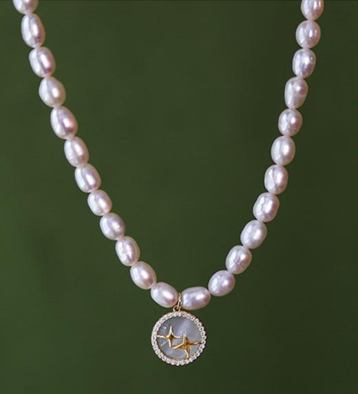 Elegant Pearl and Cat's Eye Charm Necklace with Gold Plating