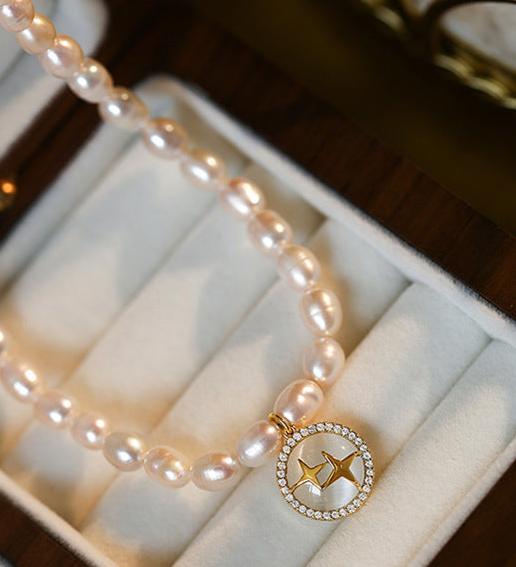 Elegant Pearl and Cat's Eye Charm Necklace with Gold Plating