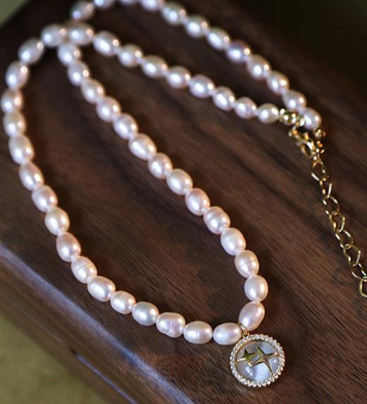 Elegant Pearl and Cat's Eye Charm Necklace with Gold Plating