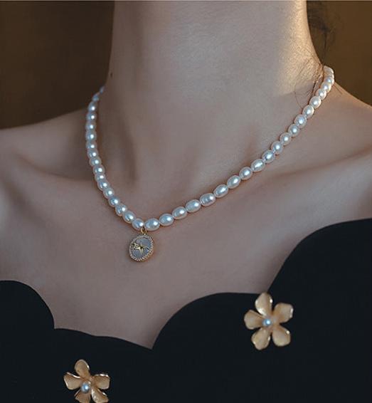 Elegant Pearl and Cat's Eye Charm Necklace with Gold Plating