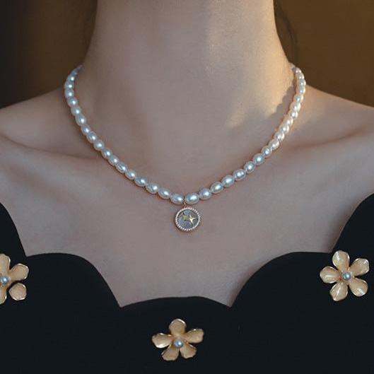 Elegant Pearl and Cat's Eye Charm Necklace with Gold Plating